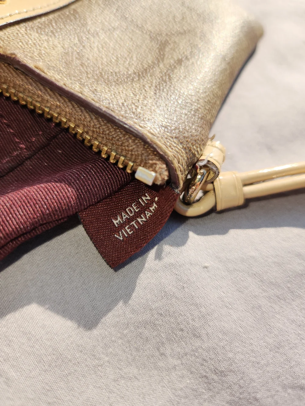 COACH Signature Canvas Wristlet in Brown with Tan Accent